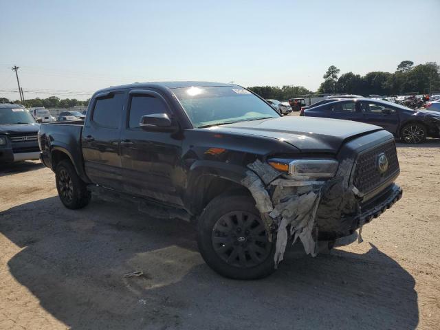 3TMGZ5AN3PM607707 - 2023 TOYOTA TACOMA DOUBLE CAB BLACK photo 4