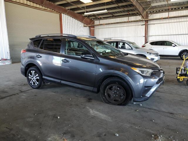 2T3ZFREV0JW433202 - 2018 TOYOTA RAV4 LE Grau Foto 4