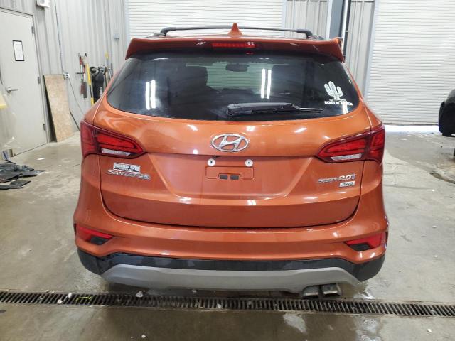 5XYZUDLA0JG516670 - 2018 HYUNDAI SANTA FE S ORANGE photo 6