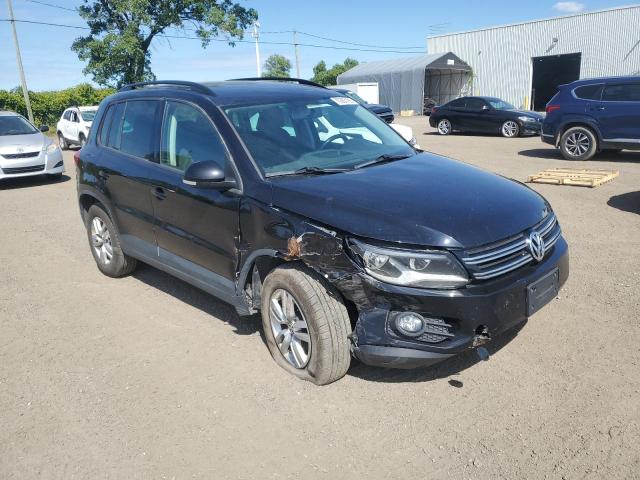WVGHV7AXXFW534407 - 2015 VOLKSWAGEN TIGUAN S BLACK photo 4
