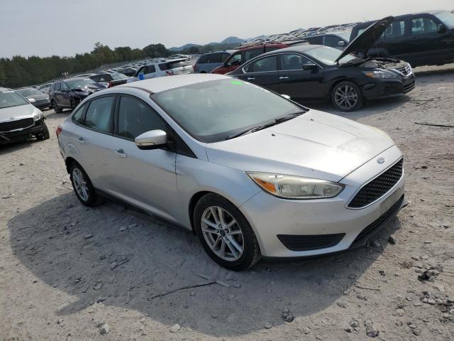 1FADP3F27FL224385 - 2015 FORD FOCUS SE SILVER photo 4