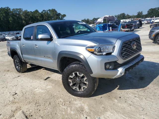 3TYAZ5CN5PT038964 - 2023 TOYOTA TACOMA DOUBLE CAB SILVER photo 4