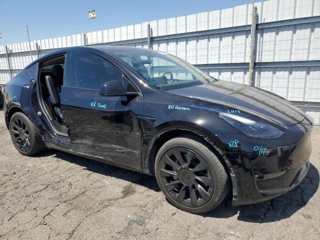 7SAYGAEE5PF589408 - 2023 TESLA MODEL Y შავი ფოტო 4