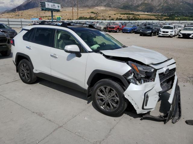 JTMD6RFV4PD097715 - 2023 TOYOTA RAV4 LIMITED WHITE photo 4