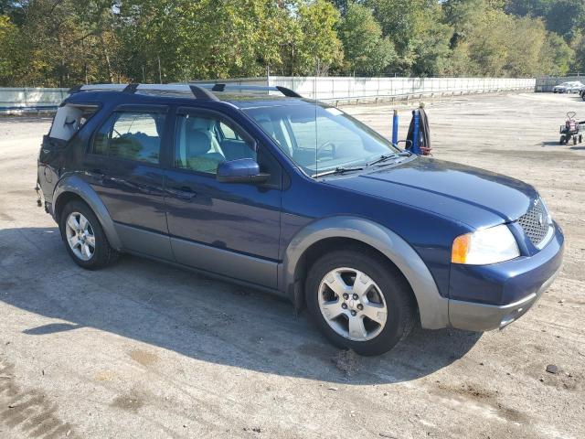 1FMDK05117GA40095 - 2007 FORD FREESTYLE SEL BLUE photo 4