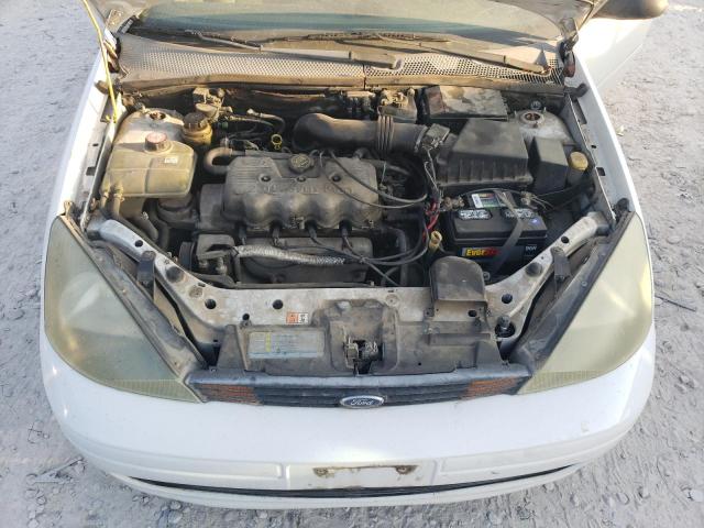 1FAFP34P03W171093 - 2003 FORD FOCUS SE WHITE photo 11