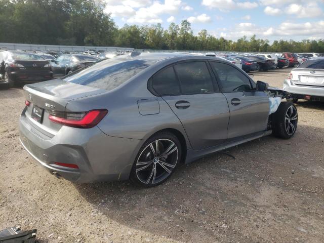 3MW69FF09P8D49987 - 2023 BMW 330I GRAY photo 3