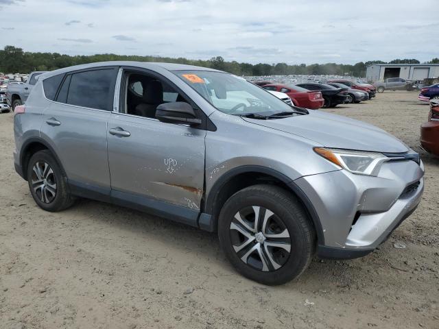 2T3ZFREV4JW460368 - 2018 TOYOTA RAV4 LE SILVER photo 4