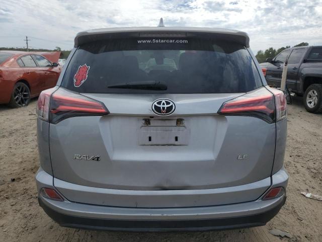 2T3ZFREV4JW460368 - 2018 TOYOTA RAV4 LE SILVER photo 6