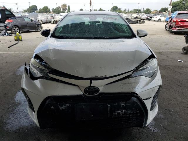 5YFBURHE8JP804166 - 2018 TOYOTA COROLLA L WHITE photo 5