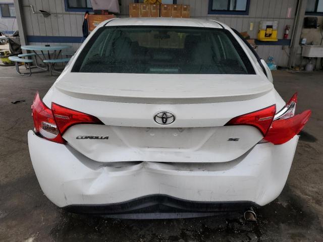 5YFBURHE8JP804166 - 2018 TOYOTA COROLLA L WHITE photo 6