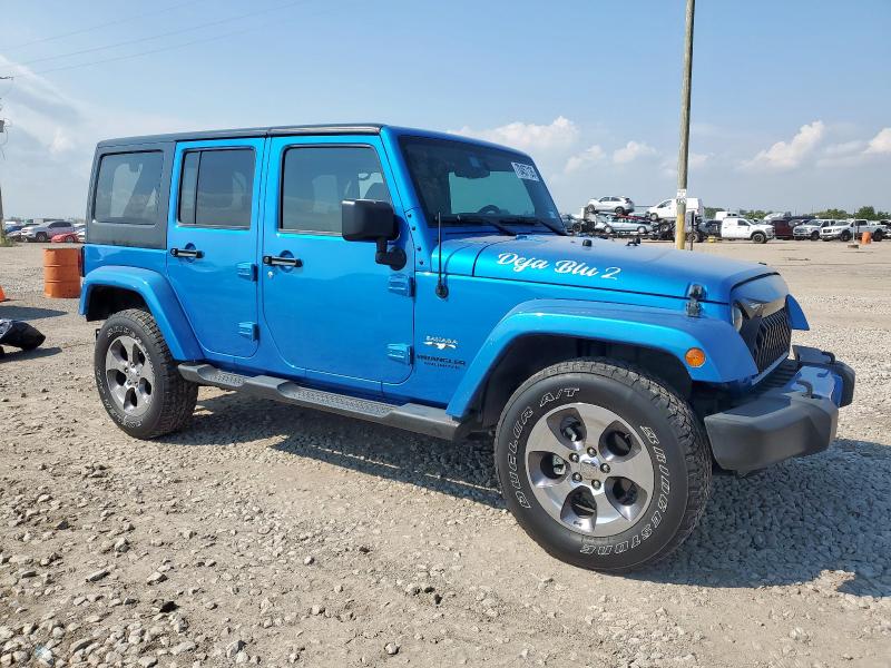 1C4BJWEGXGL301169 - 2016 JEEP WRANGLER UNLIMITED SAHARA BLUE photo 4