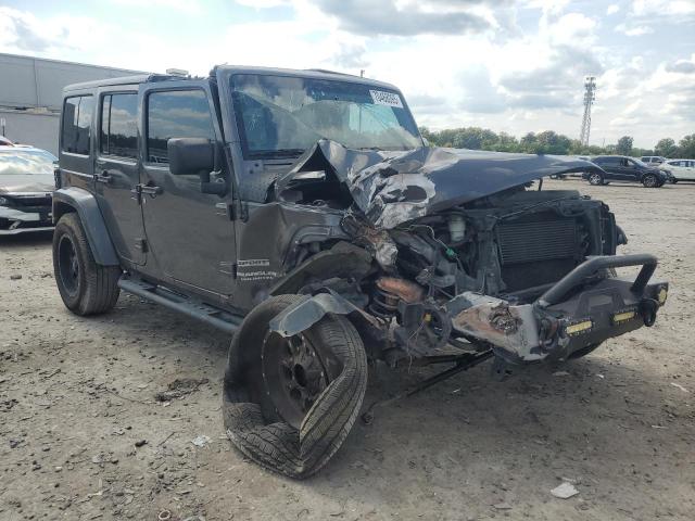 1C4BJWDG8GL279870 - 2016 JEEP WRANGLER U SPORT Grau Foto 4