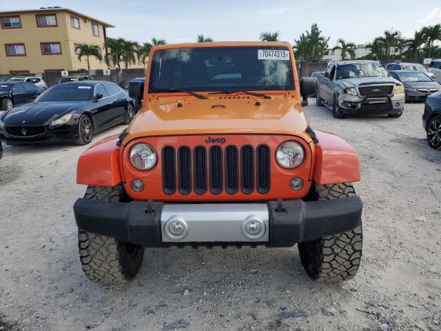 1C4HJWEG8FL636942 - 2015 JEEP WRANGLER U SAHARA ORANGE photo 5
