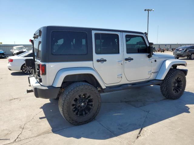 1J4BA5H14BL633094 - 2011 JEEP WRANGLER U SAHARA SILVER photo 3