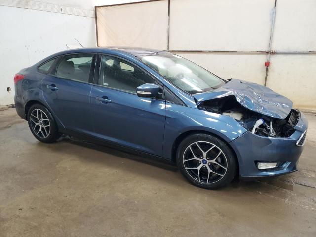 1FADP3H27JL216020 - 2018 FORD FOCUS SEL BLUE photo 4