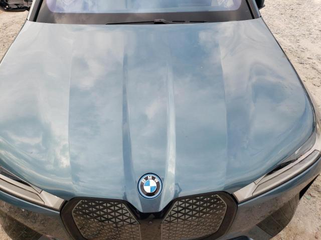 WB523CF09SCT73754 - 2025 BMW IX XDRIVE50 TEAL photo 12