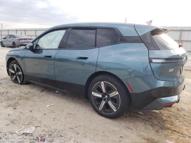 WB523CF09SCT73754 - 2025 BMW IX XDRIVE50 TEAL photo 2
