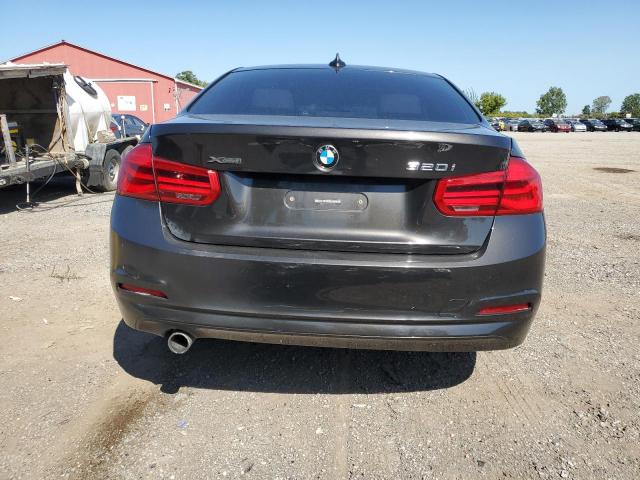 WBA8E5G57HNU42420 - 2017 BMW 320 XI BLACK photo 6