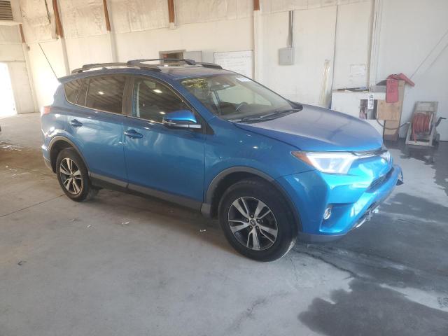 JTMWFREV5HJ710647 - 2017 TOYOTA RAV4 XLE BLUE photo 4
