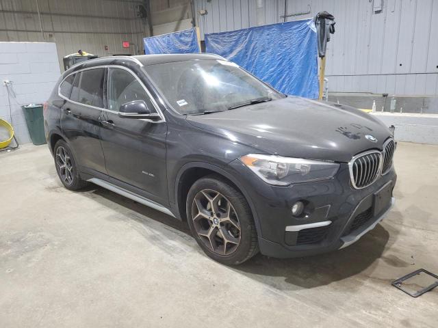 WBXHT3C38G5E50645 - 2016 BMW X1 XDRIVE28I შავი ფოტო 4
