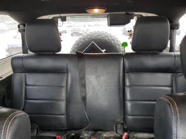 1C4BJWEG1CL183880 - 2012 JEEP WRANGLER U SAHARA BLACK photo 10