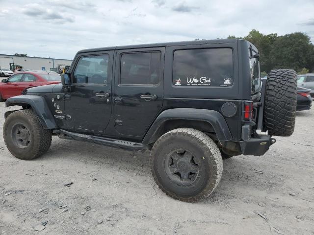 1C4BJWEG1CL183880 - 2012 JEEP WRANGLER U SAHARA BLACK photo 2