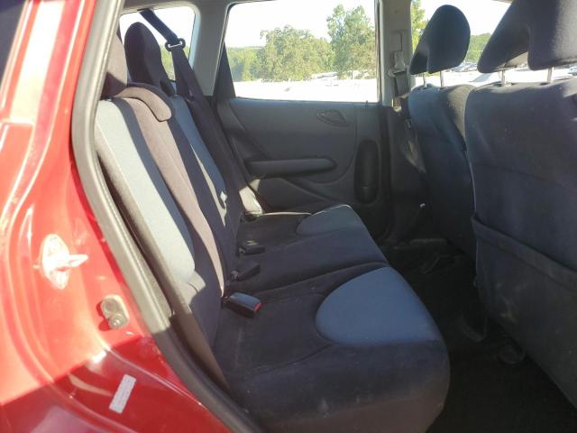 JHMGD38637S012198 - 2007 HONDA FIT S RED photo 10