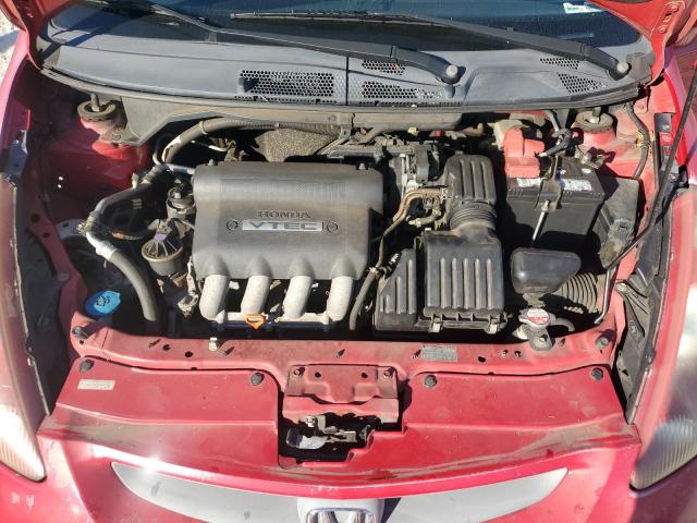JHMGD38637S012198 - 2007 HONDA FIT S RED photo 11
