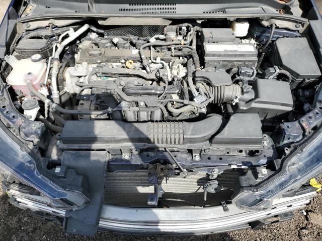 5YFP4MCE9MP097891 - 2021 TOYOTA COROLLA SE Blau Foto 11