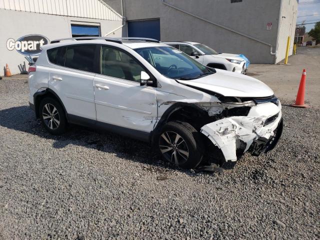 JTMRFREV3GJ100807 - 2016 TOYOTA RAV4 XLE WHITE photo 4