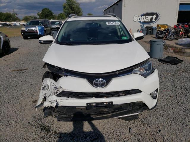 JTMRFREV3GJ100807 - 2016 TOYOTA RAV4 XLE WHITE photo 5