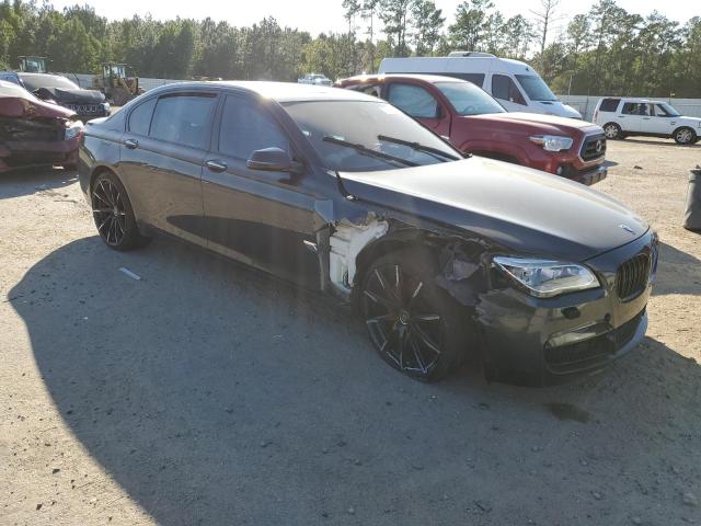 WBAYF8C53ED142699 - 2014 BMW 750 LXI BLACK photo 4