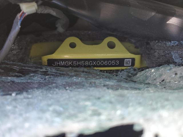 JHMGK5H58GX006053 - 2016 HONDA FIT LX YELLOW photo 12