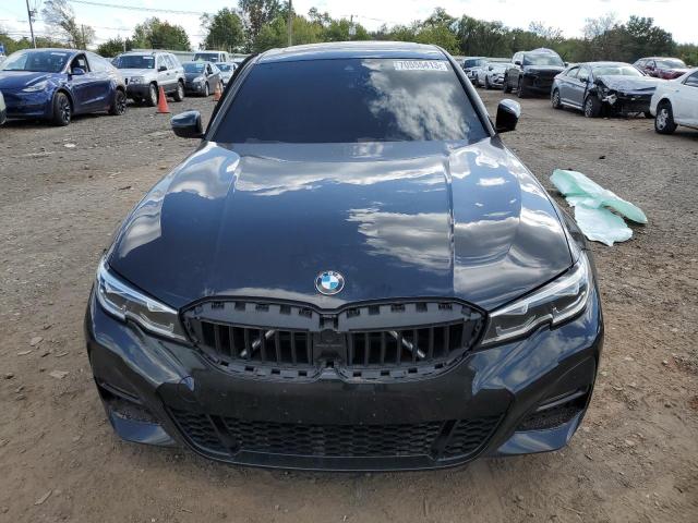 WBA5R7C54KAJ79052 - 2019 BMW 330XI BLACK photo 5