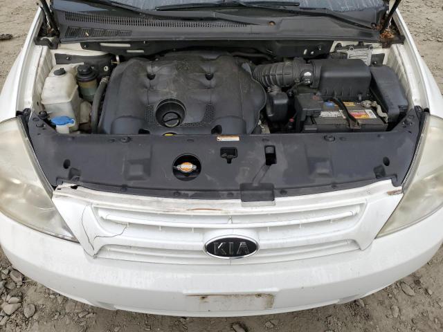 KNDMG4C35A6325543 - 2010 KIA SEDONA LX WHITE photo 11