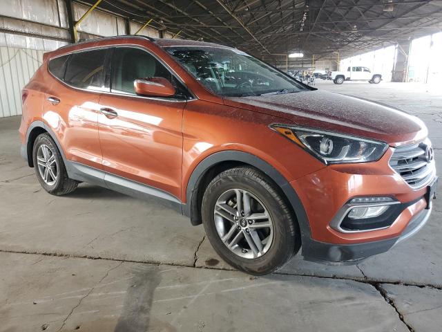 5XYZU3LB9JG521868 - 2018 HYUNDAI SANTA FE S ORANGE photo 4