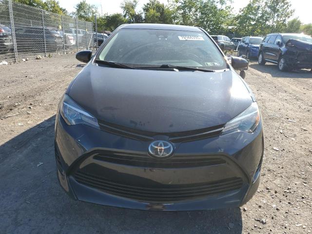 5YFBURHE5JP854944 - 2018 TOYOTA COROLLA L 蓝色 照片 5