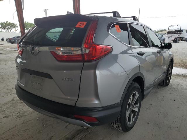 2HKRW6H32KH219264 - 2019 HONDA CR-V LX SILVER photo 3