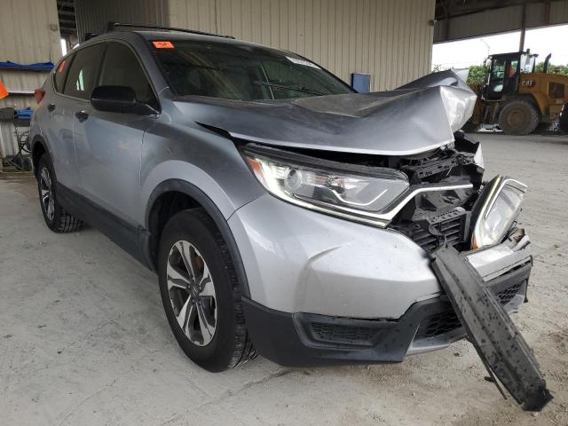2HKRW6H32KH219264 - 2019 HONDA CR-V LX SILVER photo 4
