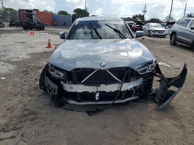 3MW69FF06R8E74285 - 2024 BMW 330I GRAY photo 5