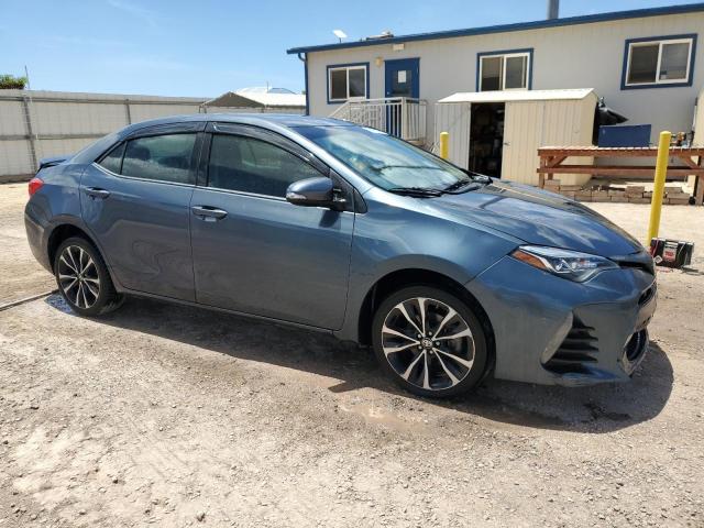 5YFBURHE1JP829586 - 2018 TOYOTA COROLLA L BLUE photo 4