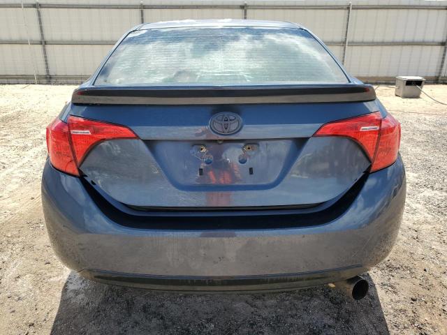5YFBURHE1JP829586 - 2018 TOYOTA COROLLA L BLUE photo 6