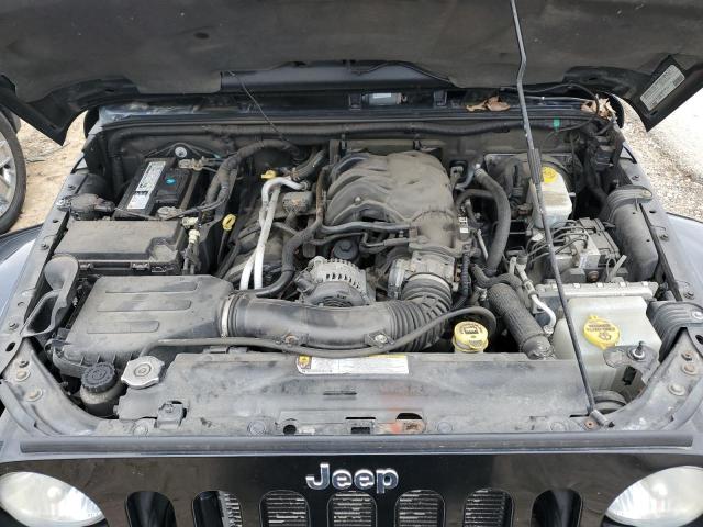 1C4BJWEG5CL117428 - 2012 JEEP WRANGLER U SAHARA BLACK photo 12