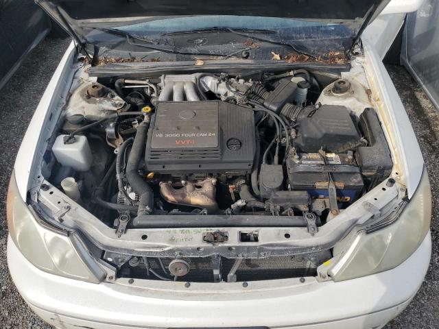 4T1BF28B74U387780 - 2004 TOYOTA AVALON XL WHITE photo 11
