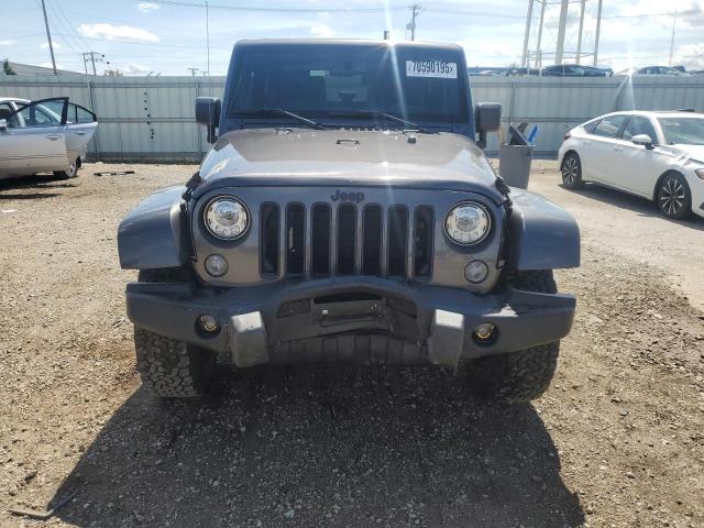 1C4AJWBG1HL605430 - 2017 JEEP WRANGLER SAHARA Серый фото 5