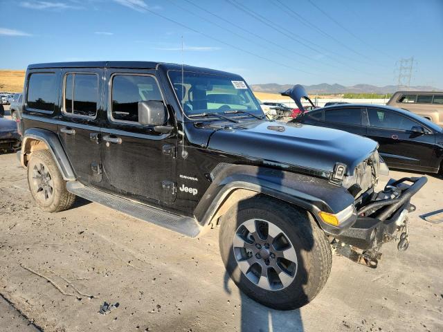 1C4HJXEN2JW246267 - 2018 JEEP WRANGLER U SAHARA Negro foto 4