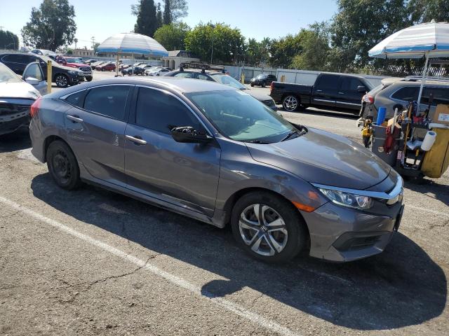 2HGFC2F56JH501828 - 2018 HONDA CIVIC LX Сірий фото 4