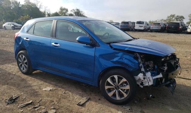 3KPA25AD8PE590916 - 2023 KIA RIO S BLUE photo 4