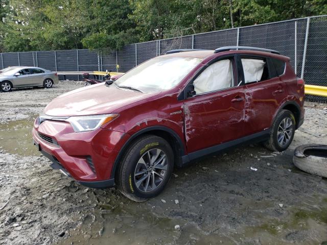 JTMRJREV1JD245770 - 2018 TOYOTA RAV4 HV LE RED photo 1